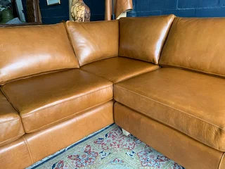 A magnificent (3m x 2.5m) full grain genuine leather ANNILINE DESIGN L-shape corner lounge suite.