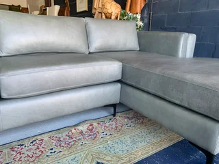Brand new (2.7m x 1.7m) pepper grey genuine leather daybed unit. (A MODERN TOUCH INTERIOR DESIGN)