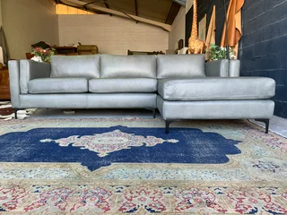 Brand new (2.7m x 1.7m) pepper grey genuine leather daybed unit. (A MODERN TOUCH INTERIOR DESIGN)