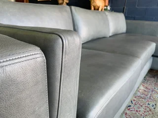 Brand new (2.7m x 1.7m) pepper grey genuine leather daybed unit. (A MODERN TOUCH INTERIOR DESIGN)