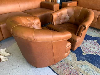 (ON PROMOTION) 2 x immaculate genuine leather DEEP BUTTONED CHESTERFIELD tubchairs R15995 for both.