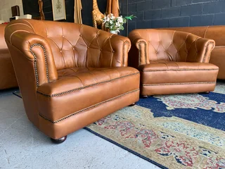 (ON PROMOTION) 2 x immaculate genuine leather DEEP BUTTONED CHESTERFIELD tubchairs R15995 for both.