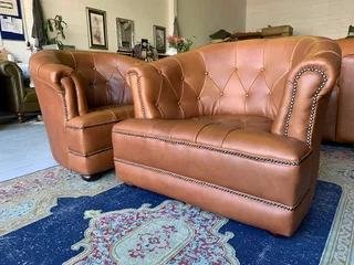 (ON PROMOTION) 2 x immaculate genuine leather DEEP BUTTONED CHESTERFIELD tubchairs R15995 for both.