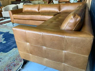 Brand new (2.8m x 2.4m)  genuine leather MODERN &amp; SLEEK DESIGN L-shape corner lounge suite.