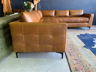 Brand new (2.8m x 2.4m)  genuine leather MODERN &amp; SLEEK DESIGN L-shape corner lounge suite.