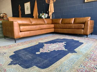 Brand new (2.8m x 2.4m)  genuine leather MODERN &amp; SLEEK DESIGN L-shape corner lounge suite.