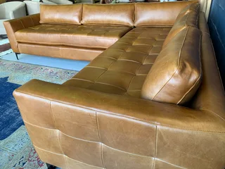 Brand new (2.8m x 2.4m)  genuine leather MODERN &amp; SLEEK DESIGN L-shape corner lounge suite.