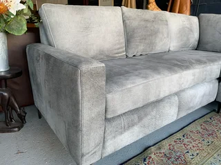 A magnificent (2.4m x 2.4m) ZAMBEZI GRAPHITE GREY genuine leather L-shape corner lounge suite,
