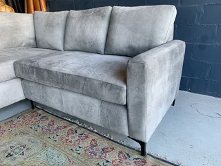 A magnificent (2.4m x 2.4m) ZAMBEZI GRAPHITE GREY genuine leather L-shape corner lounge suite,