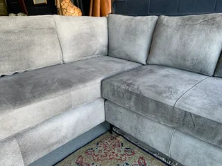 A magnificent (2.4m x 2.4m) ZAMBEZI GRAPHITE GREY genuine leather L-shape corner lounge suite,