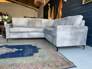 A magnificent (2.4m x 2.4m) ZAMBEZI GRAPHITE GREY genuine leather L-shape corner lounge suite,