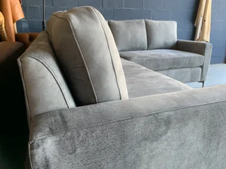 A magnificent (2.4m x 2.4m) ZAMBEZI GRAPHITE GREY genuine leather L-shape corner lounge suite,