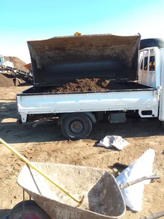 Delivery and installa off Kikuyu grass and compost weed free