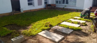 Supply and installa off roll on lawn national grass