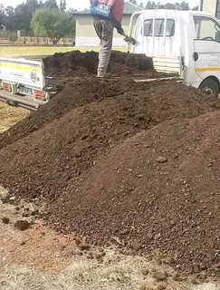 Delivery and installa  off compost &top soil and Lawn dressing