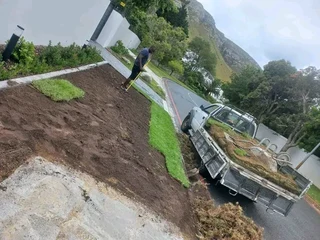 PROFESSIONALS WITH IMMENSE EXPERIENCE IN INSTALLATION &amp; LAYING NATIONAL GRASS