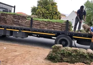 PROFESSIONALS WITH IMMENSE EXPERIENCE IN INSTALLATION &amp; LAYING NATIONAL GRASS