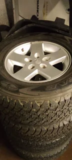 Jeep Wrangler set of wheels with new tyres.