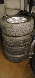 Jeep Wrangler set of wheels with new tyres.