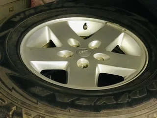 Jeep Wrangler set of wheels with new tyres.