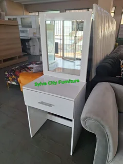 Mirror, storage, and style – all in one perfect dressing table.