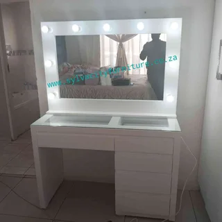 Mirror, storage, and style – all in one perfect dressing table.