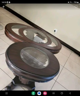 Urgent sale !!!X2 Dark brown wooden tables with intricate detail and glass tops