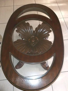 Urgent sale !!!X2 Dark brown wooden tables with intricate detail and glass tops