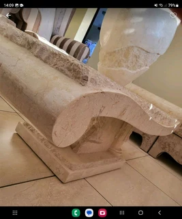 X2 Cream stone carved coffee table with matching vase and side server.  Side server alone was R19000