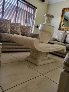 X2 Cream stone carved coffee table with matching vase and side server.  Side server alone was R19000