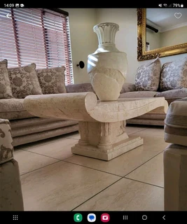 X2 Cream stone carved coffee table with matching vase and side server.  Side server alone was R19000