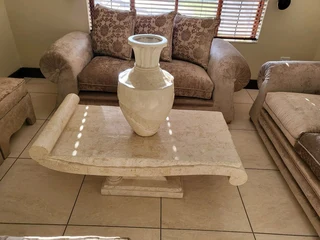 X2 Cream stone carved coffee table with matching vase and side server.  Side server alone was R19000