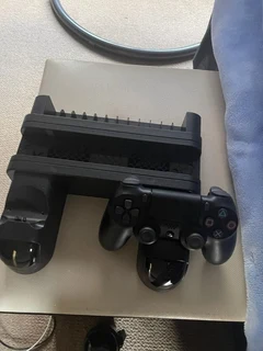 Ps4 pro 1 terabyte includes headphones and x2 controllers and games and also charging station