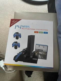 Ps4 pro 1 terabyte includes headphones and x2 controllers and games and also charging station