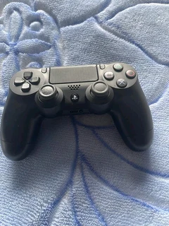 Ps4 pro 1 terabyte includes headphones and x2 controllers and games and also charging station