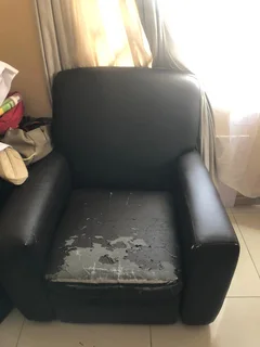 Wooden barstools and lazy boy chair