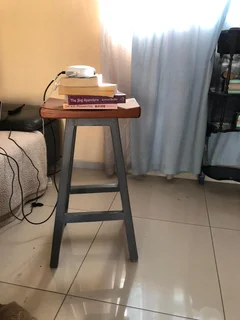 Wooden barstools and lazy boy chair