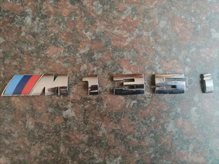 Bmw 1 series boot emblem numbers