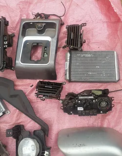 Mahindra Karoo fog lights, stereo, A/T gear trim, dashboard vents, AC control unit etc