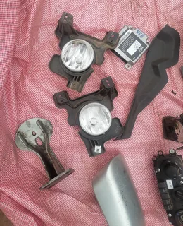 Mahindra Karoo fog lights, stereo, A/T gear trim, dashboard vents, AC control unit etc