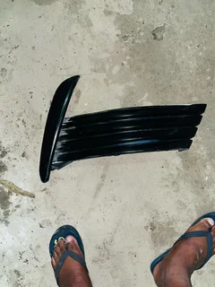 Toyota Corolla prestige right side grill or Foglight cover