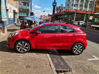 2016 Kia Rio 1.4 5-Door AT, Red with 74000km available now!