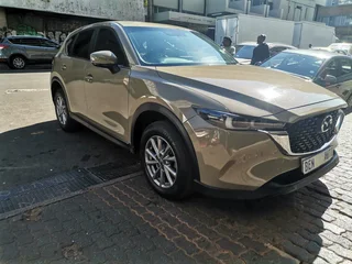 2022 Mazda CX-5 2.0 Active 4x2 AT, Gold with 64000km available now!