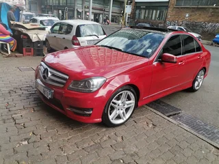 2013 Mercedes-Benz C 200 CGI BlueEFFICIENCY Avantgarde, Red with 88000km available now!