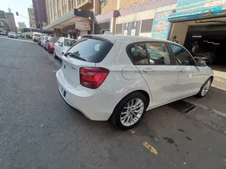 2015 BMW 118i 5-Door, White with 116000km available now!