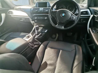 2015 BMW 118i 5-Door, White with 116000km available now!