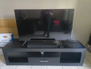Samsung TV, Sound Bar and TV Stand