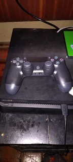 Playstation 4 with controller,2tb Seagate external harddrive and a 32 inch skywalk tv