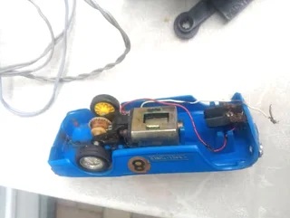 Vintage Scalextric 2 x controls 1x scalextric car needs tlc and 12x tracks.