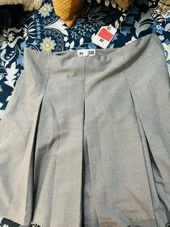 Pleated mini suiting grey . Free delivery in town